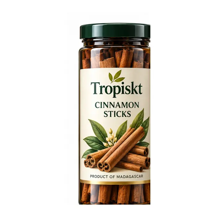 Tropiskt burk med kanelstänger